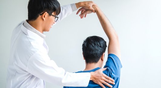 Physiotherapy exercises for shoulder recovery after arthroscopic surgery in Bangalore